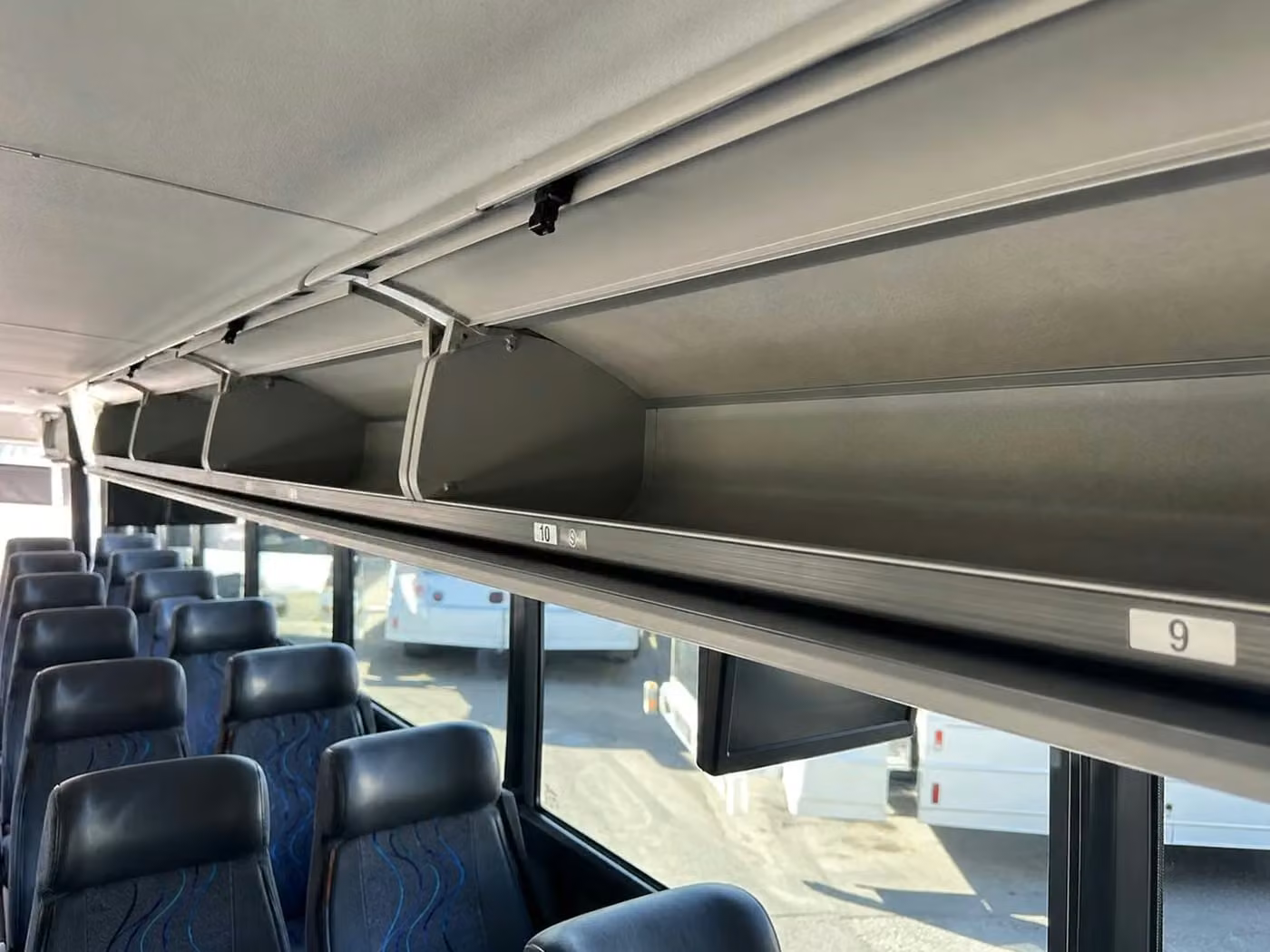 beloit 56 passenger charter bus overhead storage